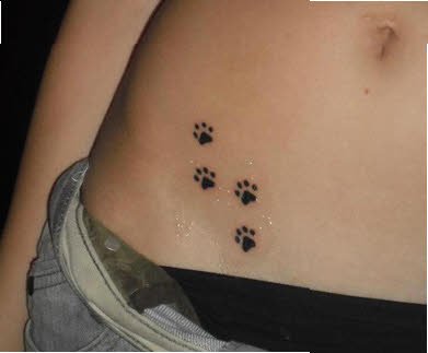 Tatuajes de huellas de animales mujeres